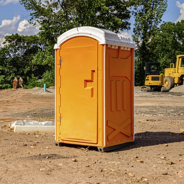 how often are the portable restrooms cleaned and serviced during a rental period in Ray MI